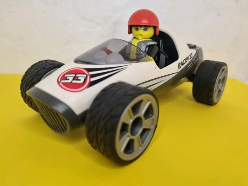 Auto de juguete Racer 33 con figura - 1