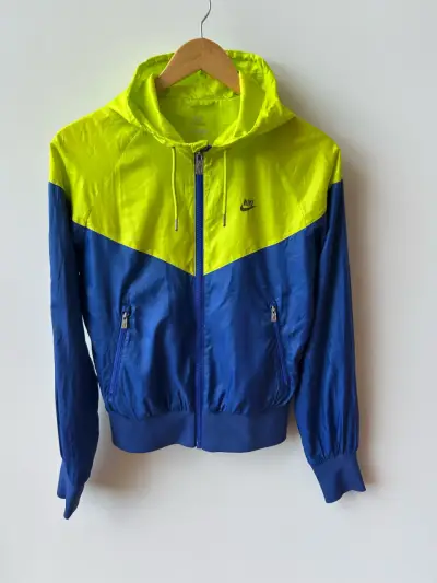 Chaqueta cortaviento Nike azul y amarillo - miniatura 1