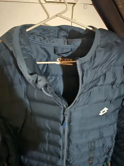 Chaqueta acolchada azul con capucha Lotto - miniatura 1