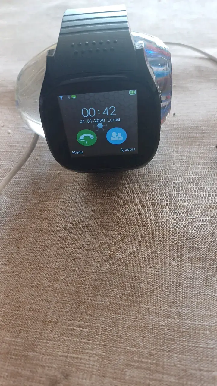 Reloj inteligente con pantalla táctil y cargador USB