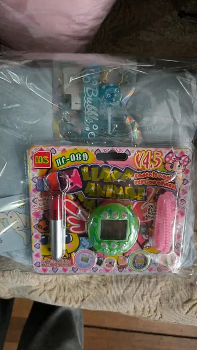 Cojín Cinnamoroll con Juguete Tamagotchi - miniatura 2
