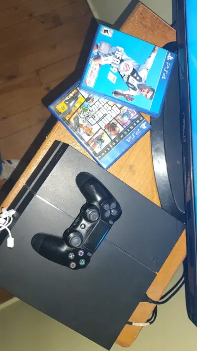Consola PS4 con juegos. - miniatura 1