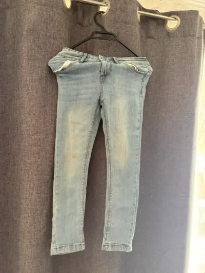 Jeans ajustados celestes para niña - miniatura 1