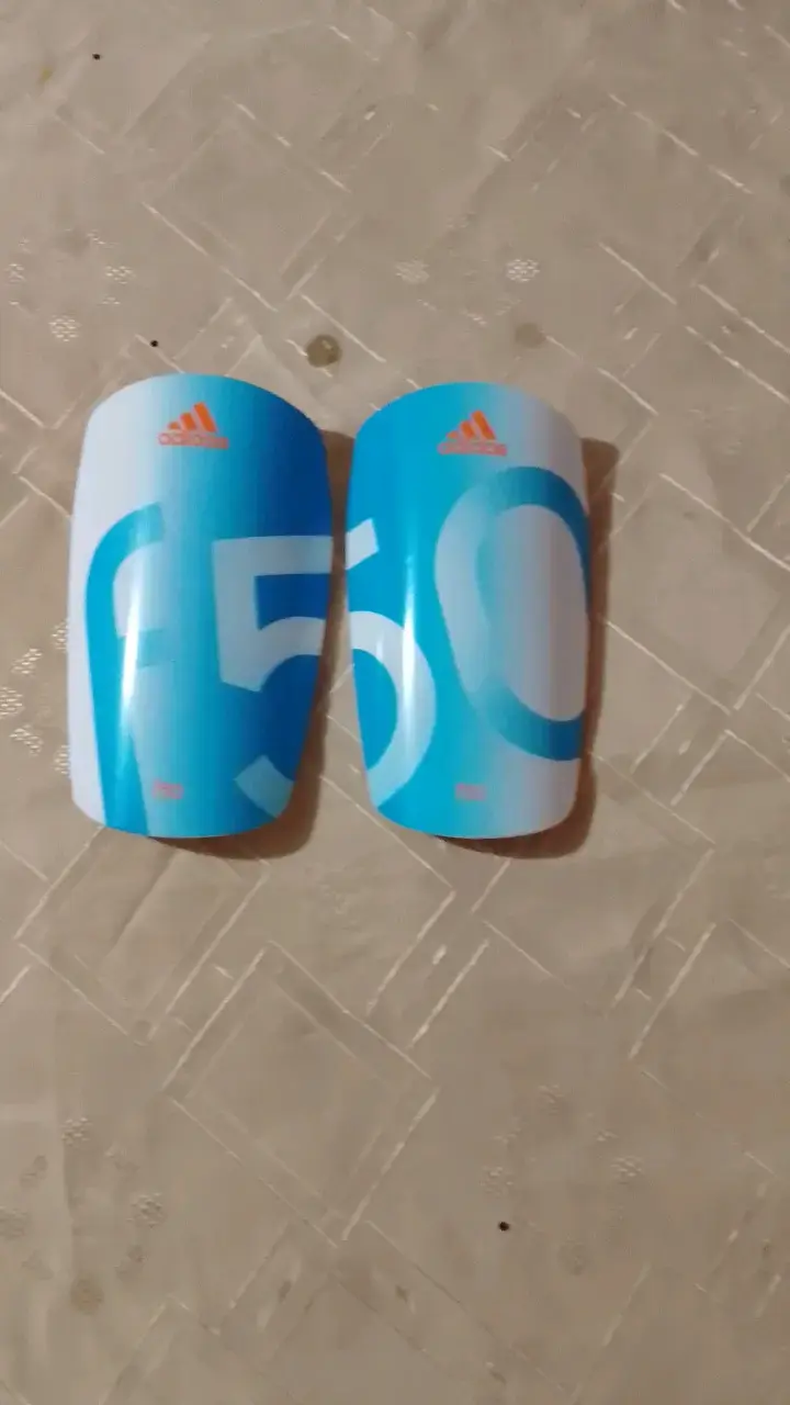 Canilleras Adidas F50 Azul Claro - 1