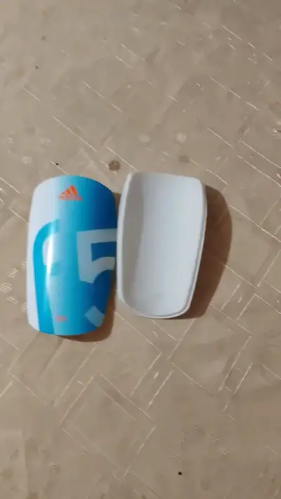 Canilleras Adidas F50 Azul Claro - miniatura 2