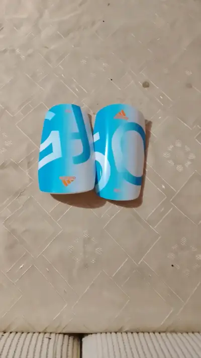 Canilleras Adidas F50 Azul Claro - miniatura 4