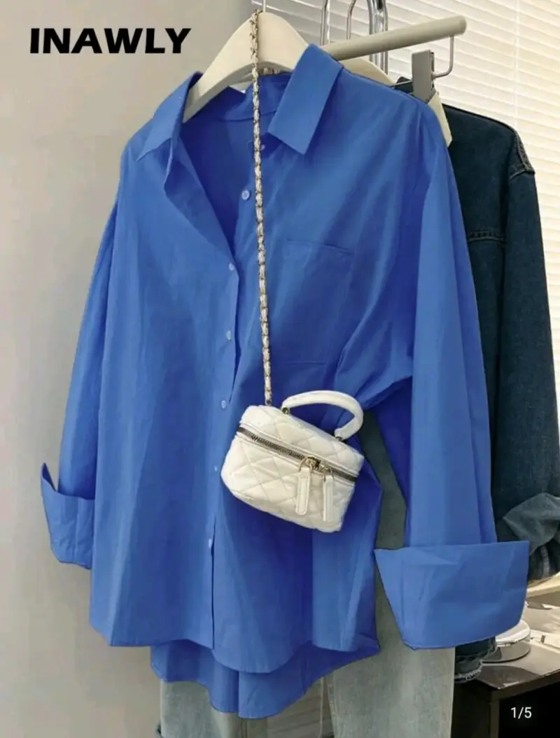 Camisa azul de manga larga para mujer