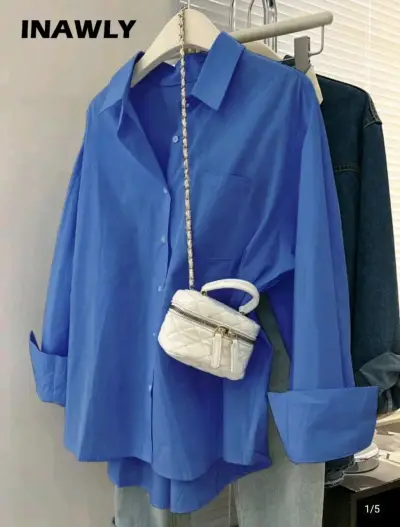 Camisa azul de manga larga para mujer - miniatura 1