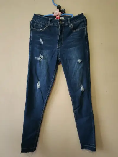 Jeans ajustados de mezclilla azul - miniatura 1