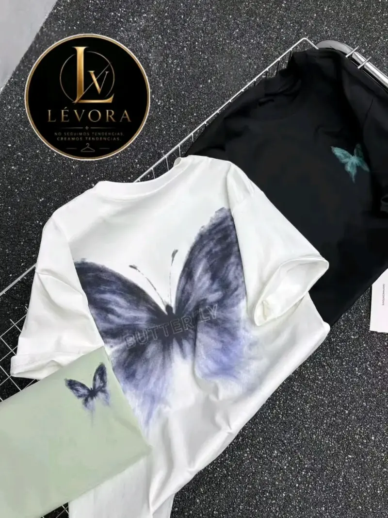 Poleras Lévora con diseño de mariposa y flor - 3