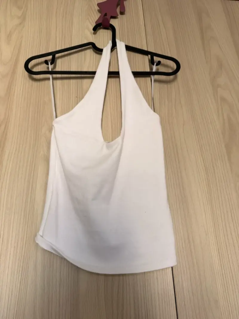 Top blanco sin mangas para mujer