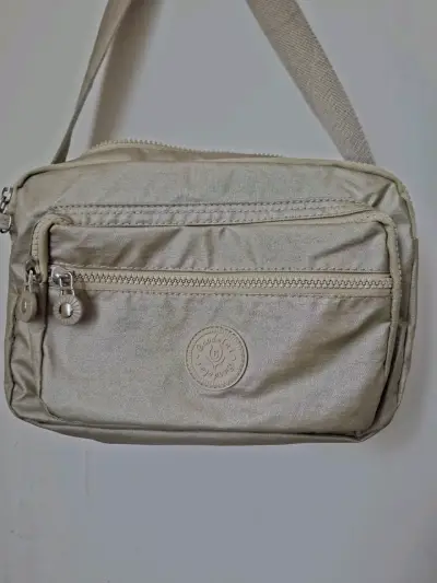 Bolso dorado o plata estilo kipling - miniatura 1