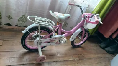 Bicicleta infantil rosa con ruedas de entrenamient - miniatura 2