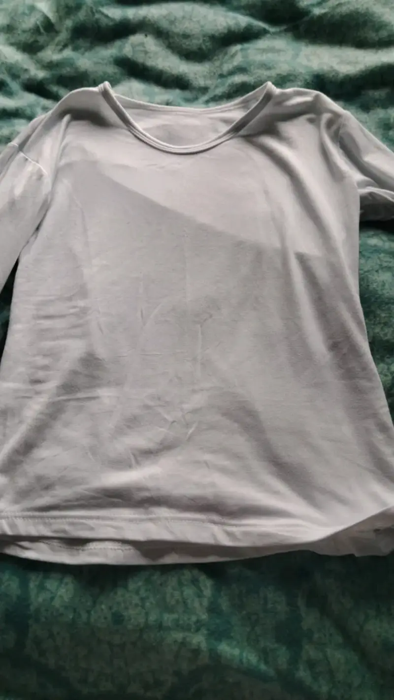 Polera blanca de manga larga para mujer