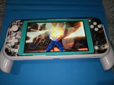 NINTENDO SWITCH LITE LIBERADA + ACCESORIOS - miniatura 3