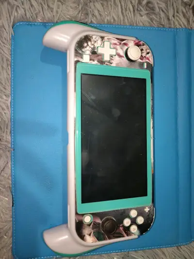 NINTENDO SWITCH LITE LIBERADA + ACCESORIOS - miniatura 5