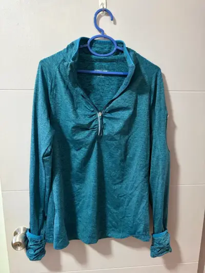 Polera deportiva azul para mujer - miniatura 1