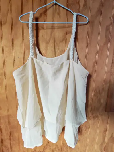 Blusa sin mangas color crema con tirantes decorativos - miniatura 1