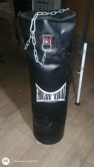 Saco de boxeo Muay Thai Unisport con cadena - miniatura 1