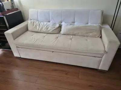 Sofá cama beige en buen estado - miniatura 1