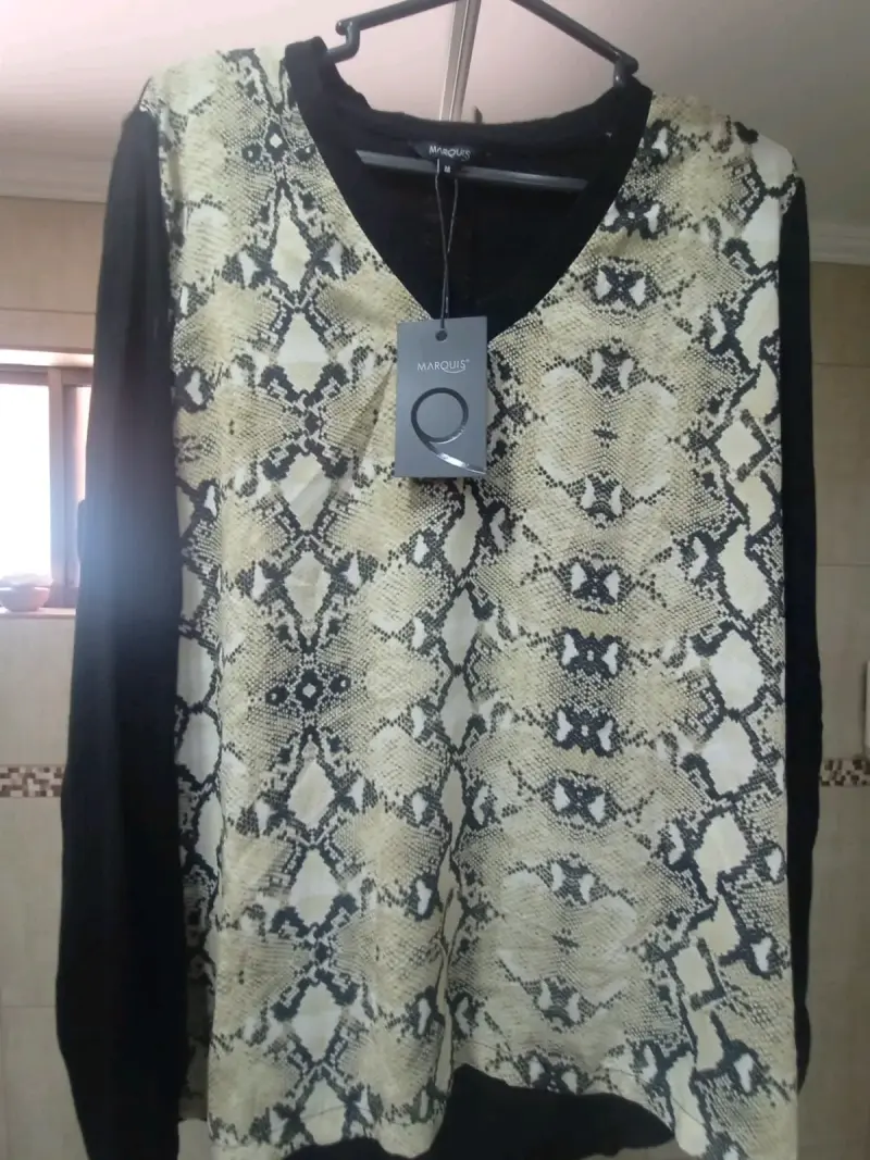 Suéter de mujer estampado animal print Marquis