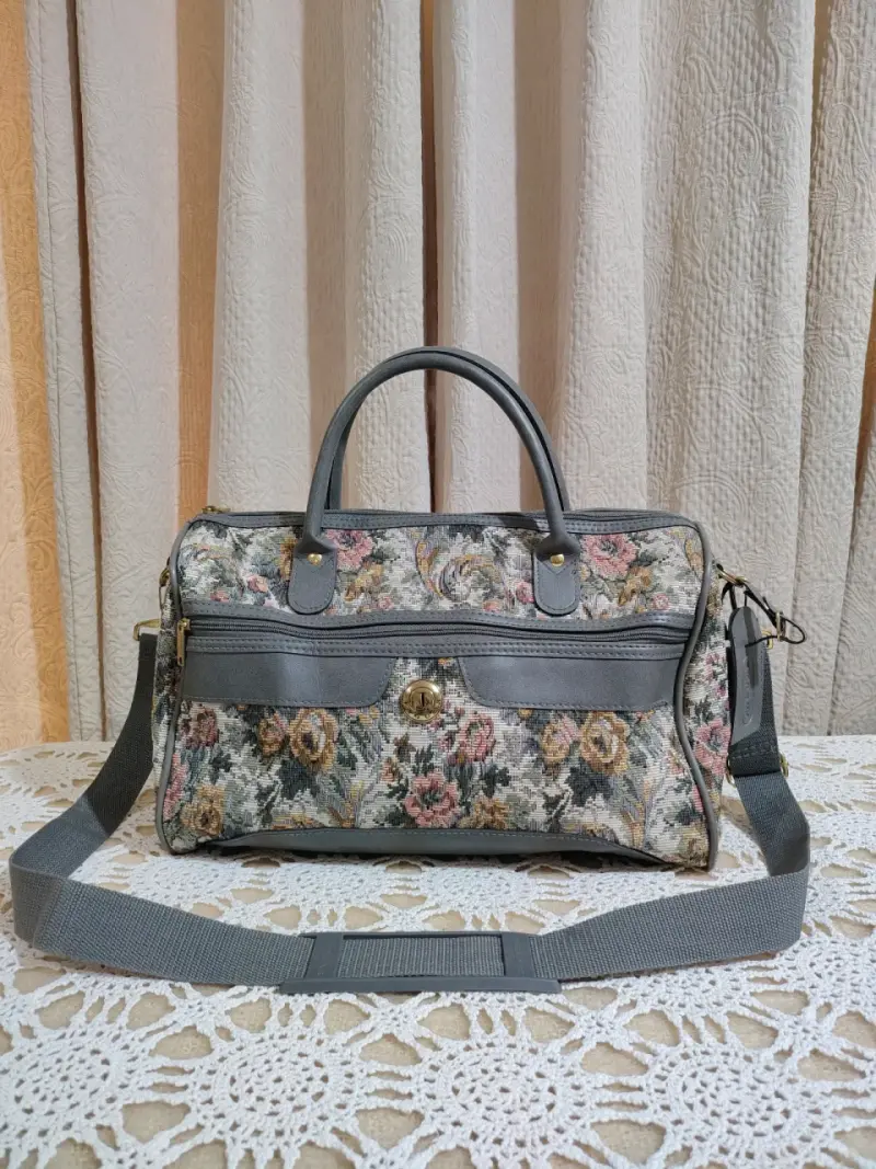 Bolso Jaguar de mano con correa ajustable