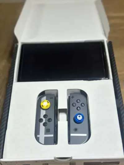 Nintendo Switch OLED con Super Smash Bros y Zelda - miniatura 2