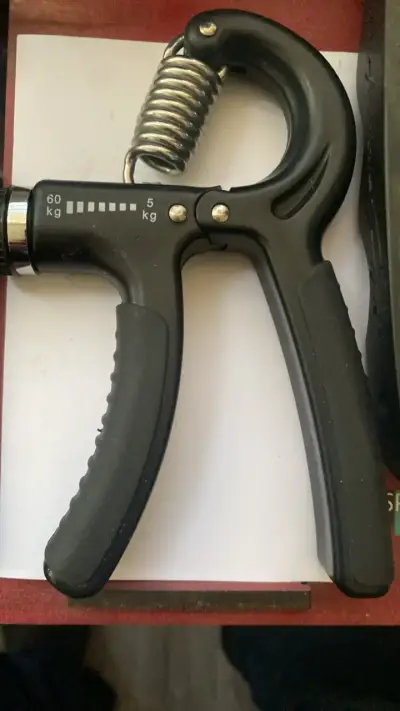 Ajustable ejercitador de mano 5-60 kg - miniatura 2