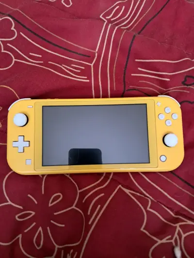 Nintendo Switch Lite + catalogo de juegos - miniatura 1