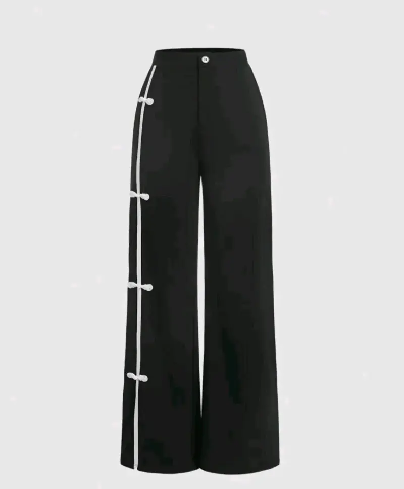 Pantalones negros con detalle de lazo blanco - 1