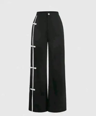 Pantalones negros con detalle de lazo blanco - miniatura 1