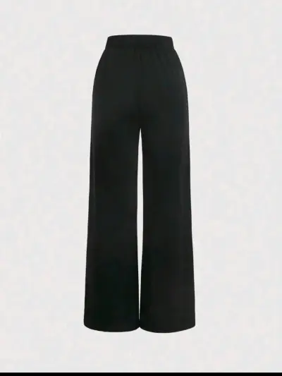 Pantalones negros con detalle de lazo blanco - miniatura 2