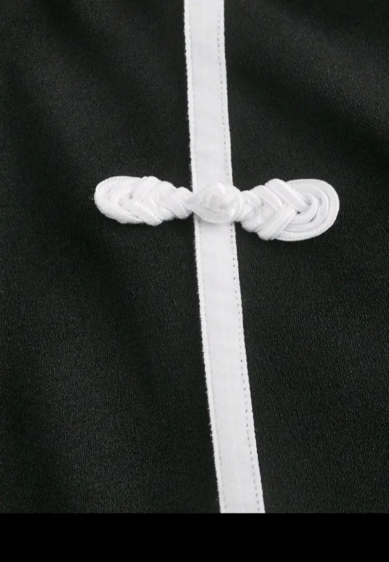 Pantalones negros con detalle de lazo blanco - 3