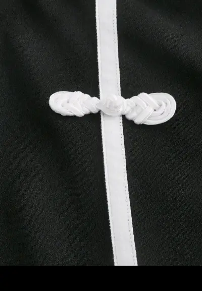 Pantalones negros con detalle de lazo blanco - miniatura 3
