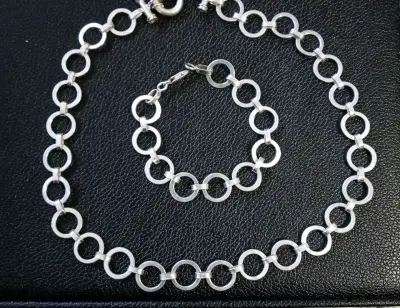 Collar y pulsera de plata con diseño de círculos - miniatura 2