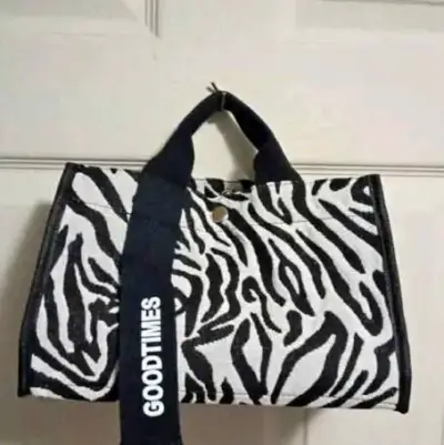Bolso de mano estampado cebra con correa ajustable - miniatura 1
