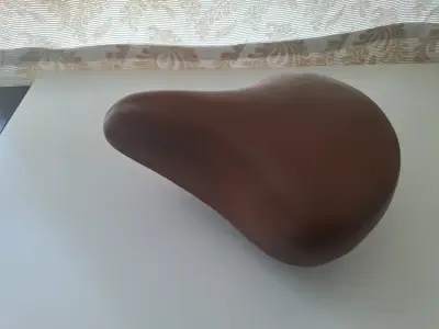 Asiento de bicicleta marrón con resortes - miniatura 1