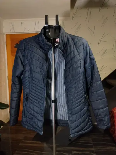 Chaqueta acolchada azul para mujer - miniatura 1