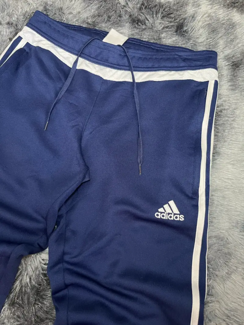 Pantalones deportivos azul Adidas con franjas - 2