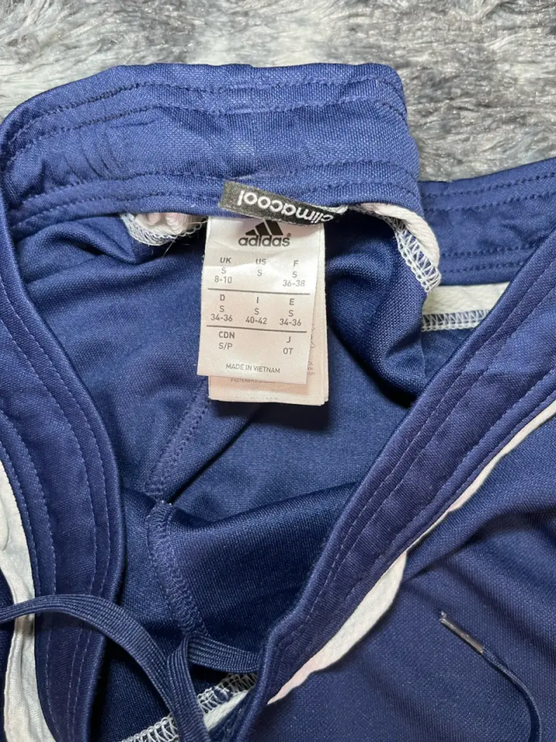 Pantalones deportivos azul Adidas con franjas - 6