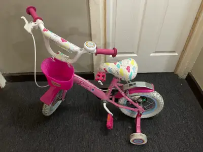 Bicicleta infantil Barbie rosa con rueditas - miniatura 1