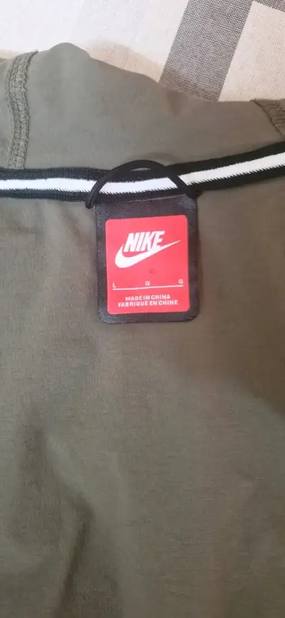 Cortavientos Nike con capucha talla L - miniatura 4