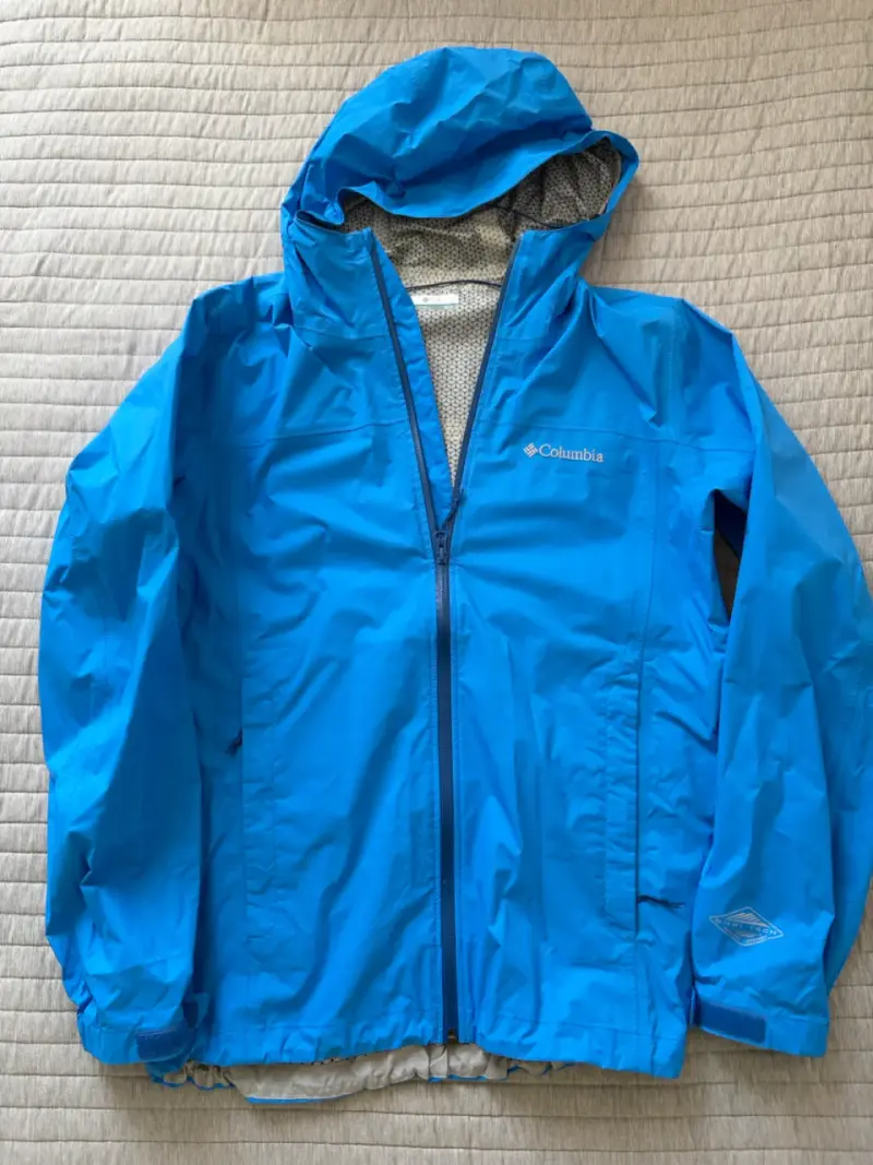 Chaqueta impermeable azul Columbia con capucha - 1
