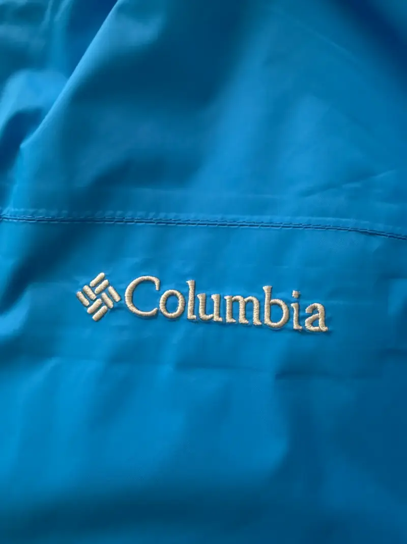 Chaqueta impermeable azul Columbia con capucha - 3