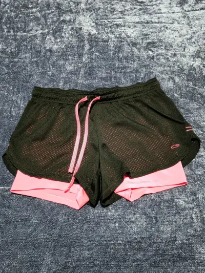 Shorts deportivos negros con rosados Champion - miniatura 1