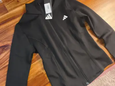 Chaqueta deportiva negra Adidas para mujer - miniatura 1