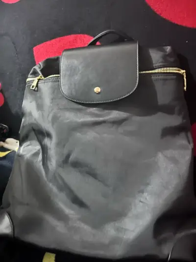 Mochila morada liviana y moderna - miniatura 3