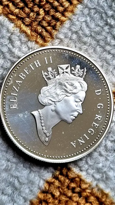 Dólar canadiense de Plata. Moneda polaca. - miniatura 3