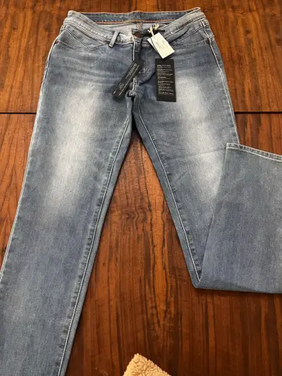 Jeans ajustados de mezclilla azul para mujer - miniatura 1