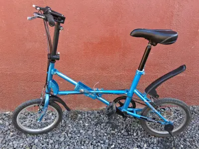 Bicicleta plegable azul Uplano en buen estado - miniatura 1